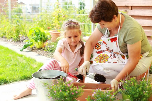 Professional cleaning service working on patio