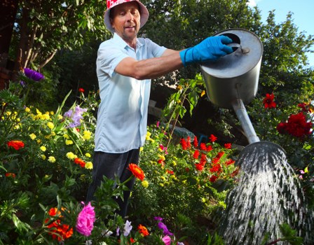 Homeowner inspecting a freshly cleaned patio