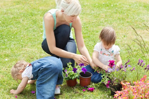 Expert technician cleaning outdoor patio surfaces